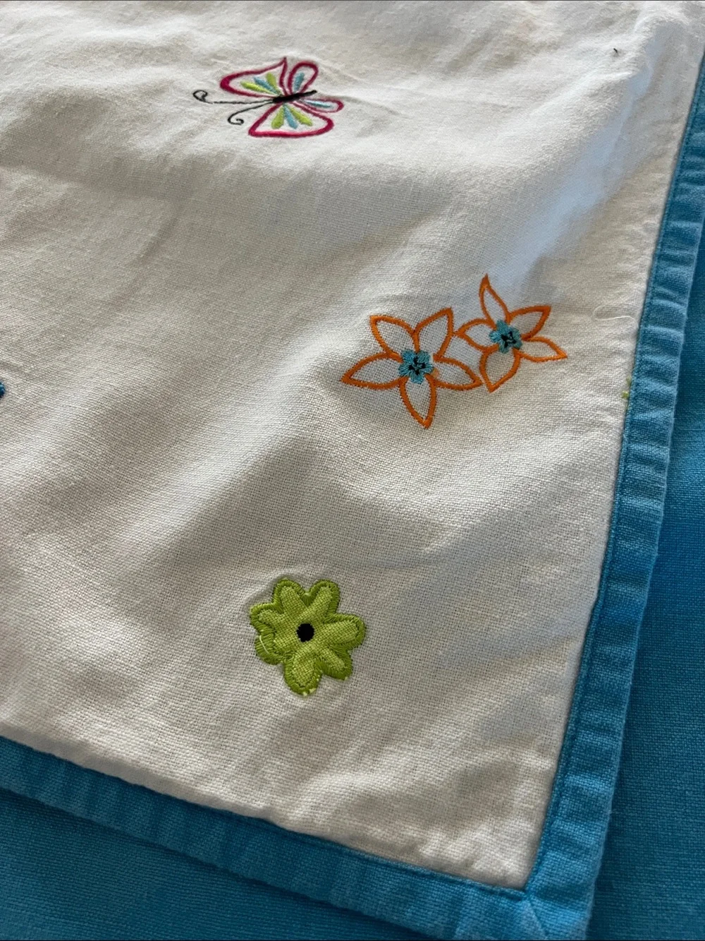 White Embroidered Floral Table Runner with Blue Trim